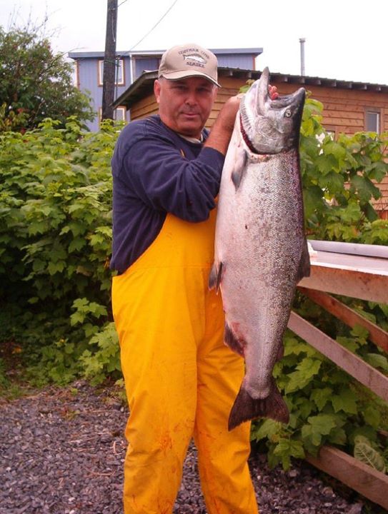 Angler with a hefty King salmon