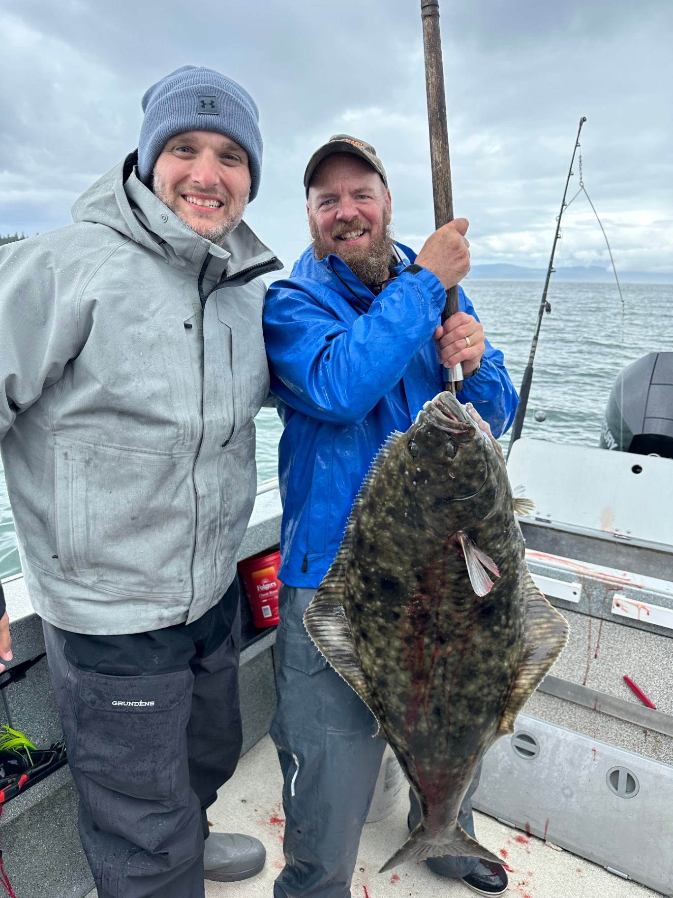 Guests with a Pacific halibut